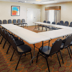 White Meeting Tables in a Rectangle